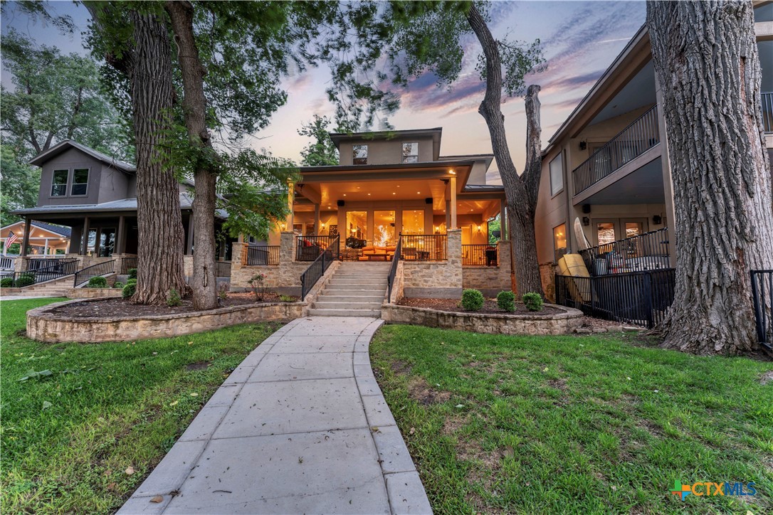 368 Rancho Road New Braunfels, TX 78130 - Photo 42 of 47 a view of a house with backyard porch and sitting area