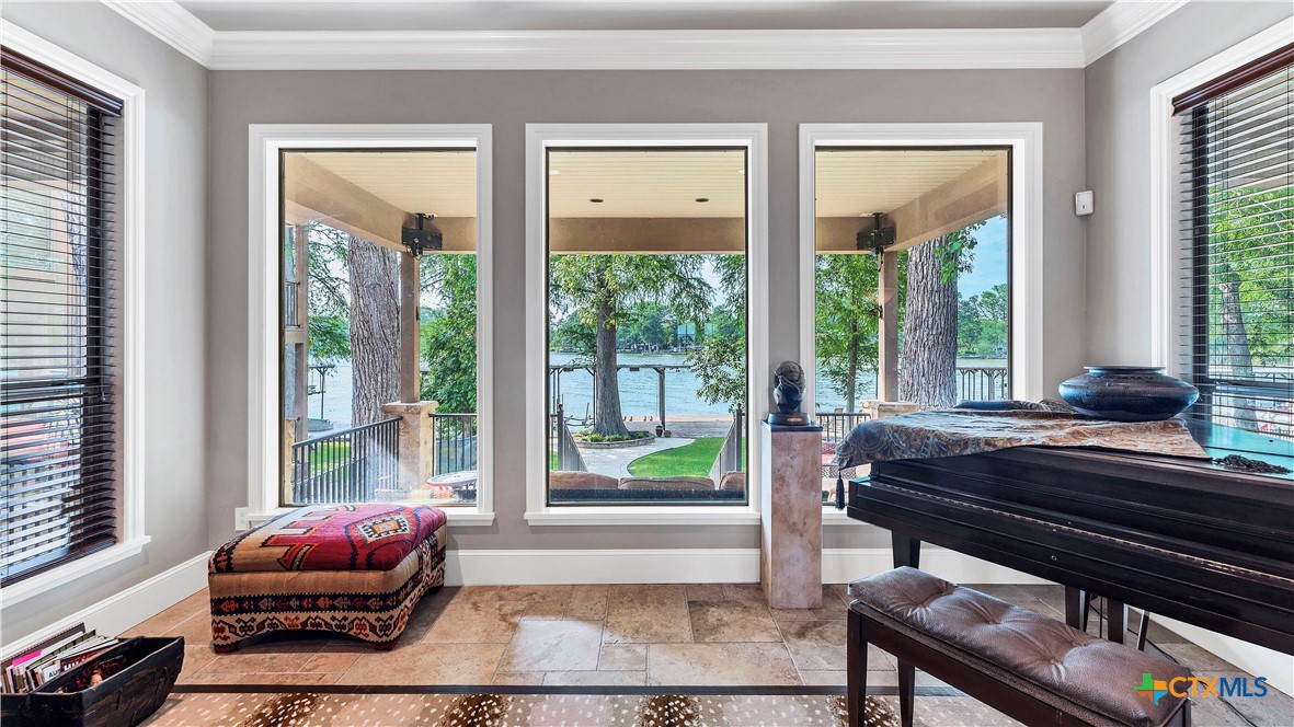 368 Rancho Road New Braunfels, TX 78130 - Photo 7 of 47 a living room with furniture and a large window