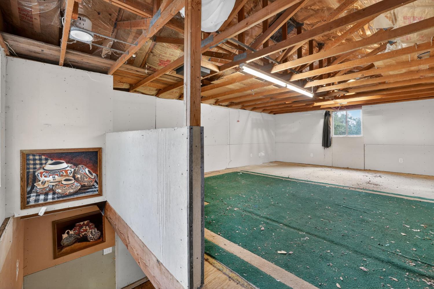 4290 Rancho Montes Drive Placerville, CA 95667 - Photo 21 of 47 a view of a room with racks on the wall