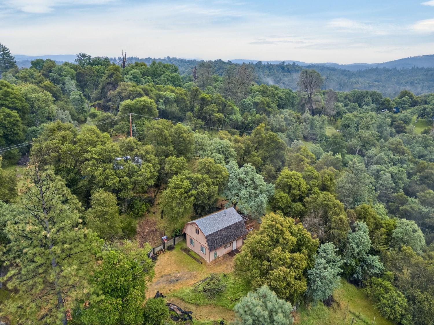 4290 Rancho Montes Drive Placerville, CA 95667 - Photo 38 of 47 an aerial view of a house with a yard