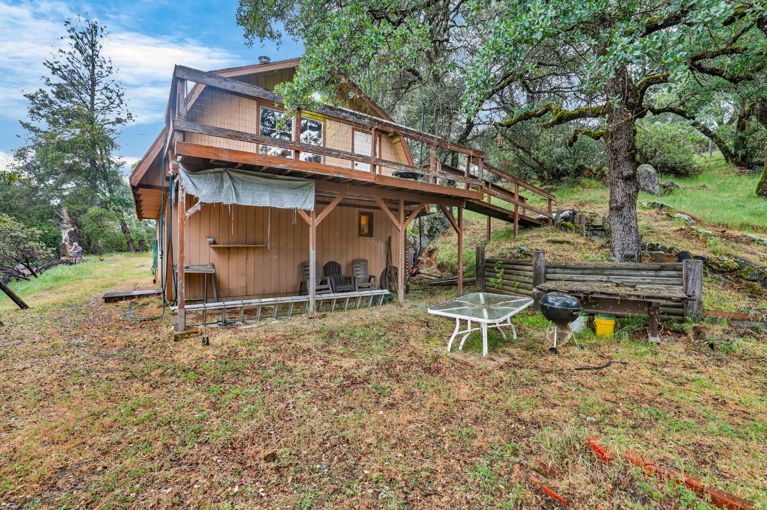 4290 Rancho Montes Drive Placerville, CA 95667 - Photo 4 of 47 a view of a house with a yard