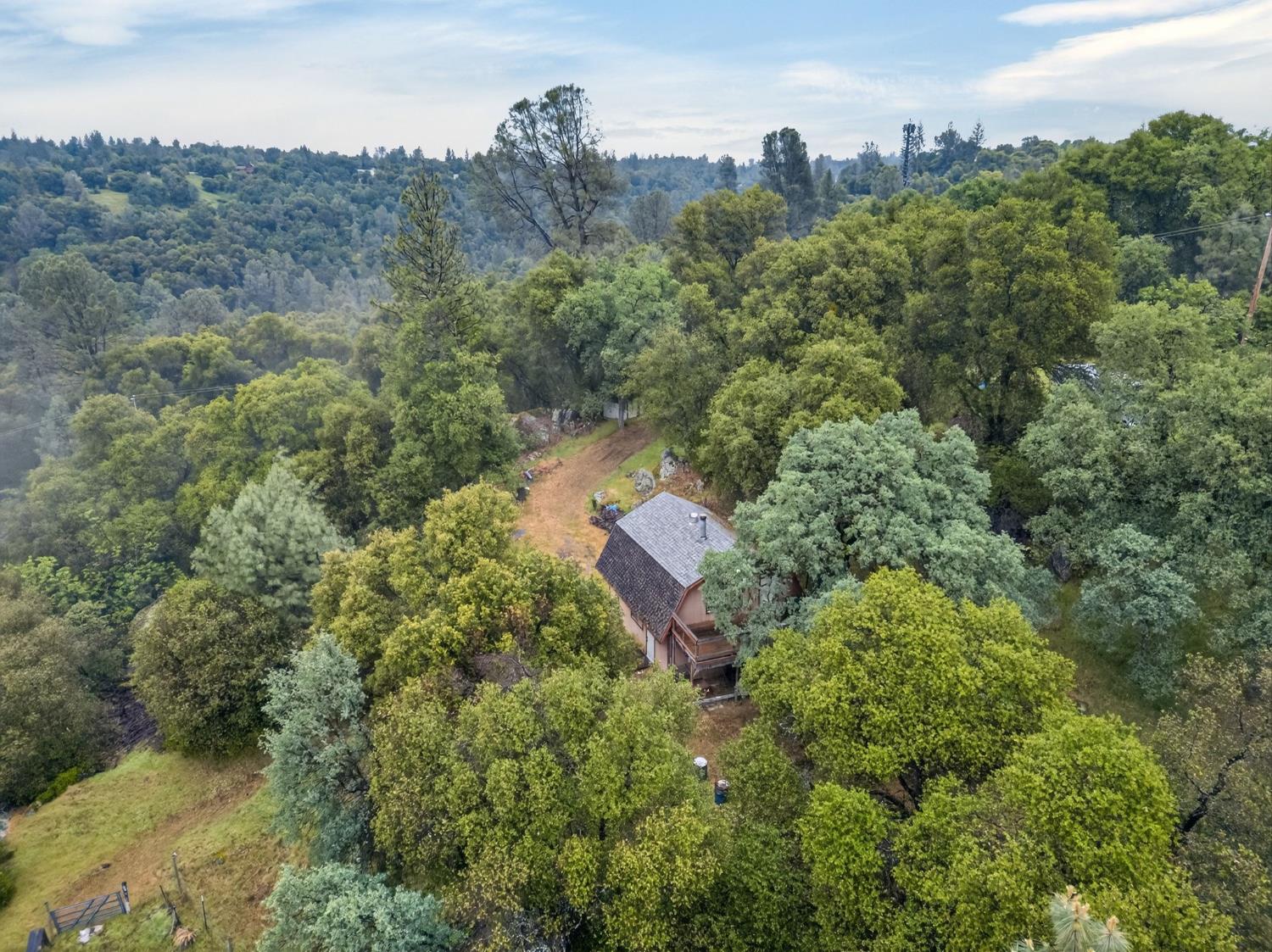 4290 Rancho Montes Drive Placerville, CA 95667 - Photo 47 of 47 an aerial view of a house with a yard