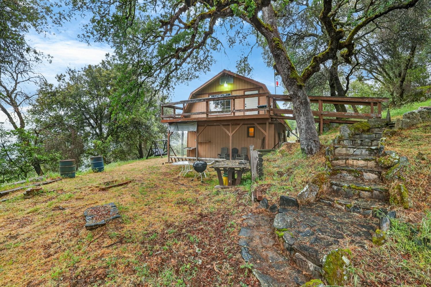 4290 Rancho Montes Drive Placerville, CA 95667 - Photo 6 of 47 a house view with a outdoor space
