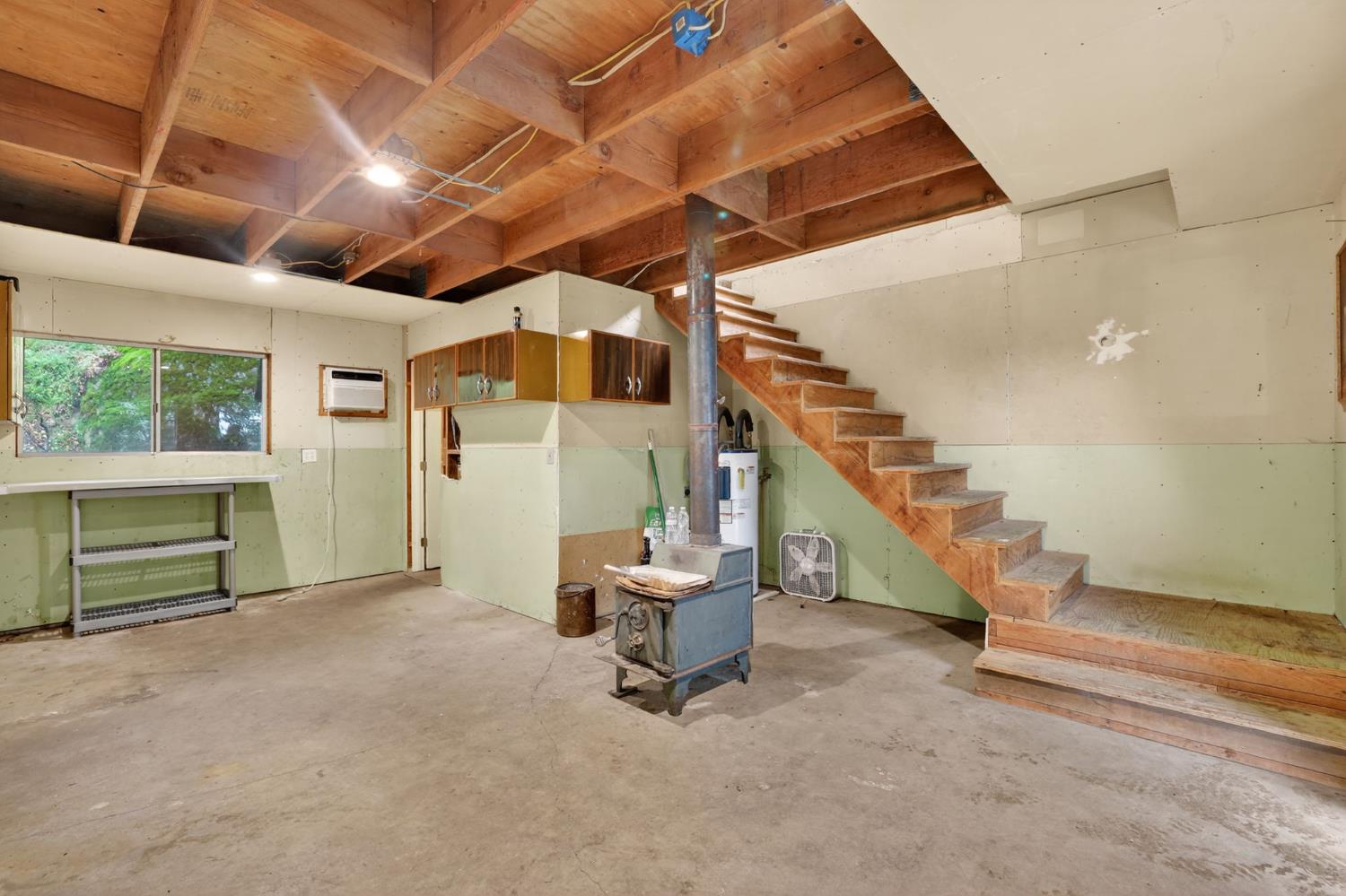 4290 Rancho Montes Drive Placerville, CA 95667 - Photo 9 of 47 a room with stairs and a wooden floor