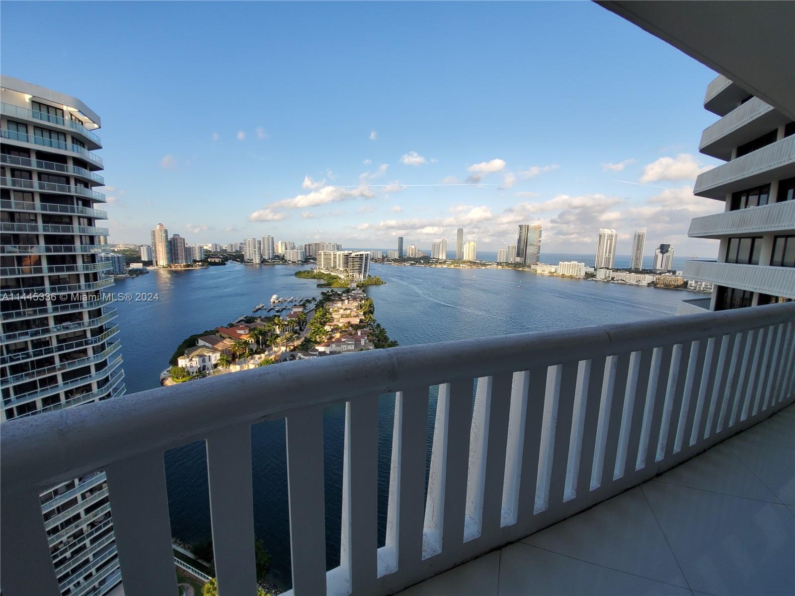 3000 Island Boulevard, Unit 2603 Aventura, FL 33160 - Photo 13 of 28 a view of a balcony with city view