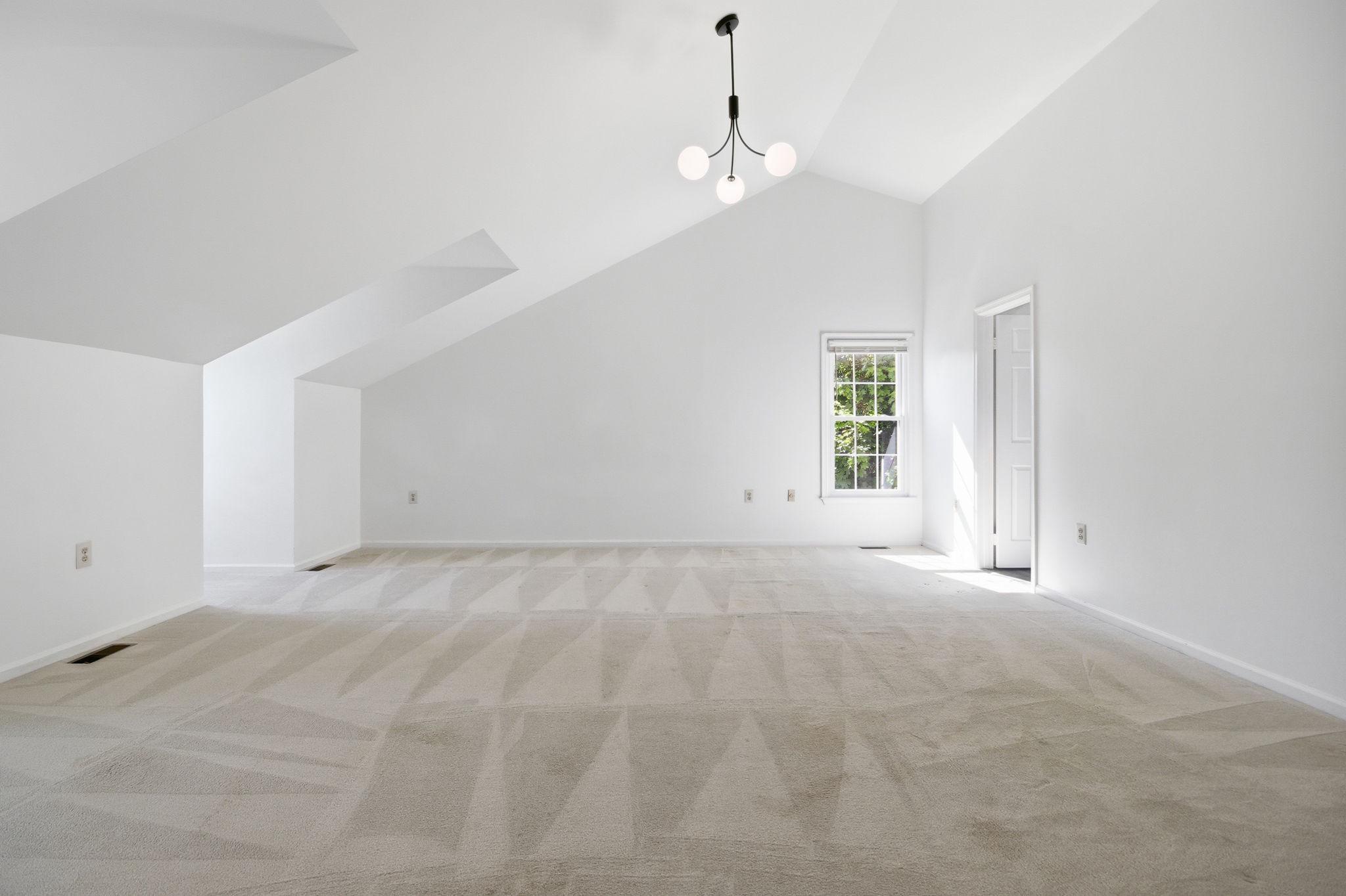 124 Englefield Drive Gaithersburg, MD 20878 - Photo 19 of 55 Spacious primary bedroom with vaulted ceilings.