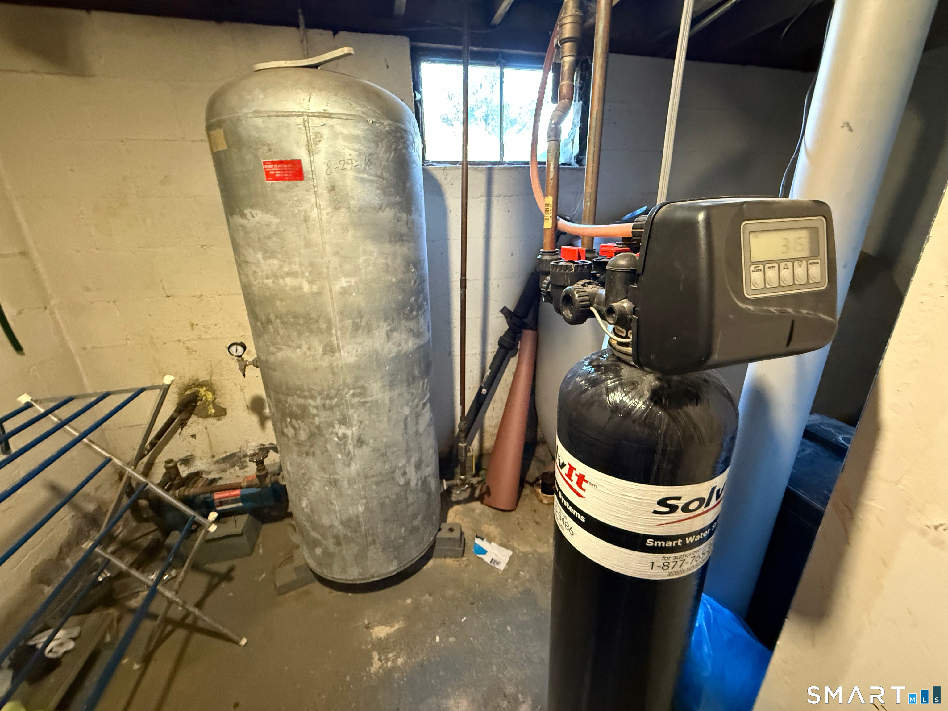 10 Purdy Road Norwalk, CT 06850 - Photo 17 of 21 a bathroom with a sink and mirror