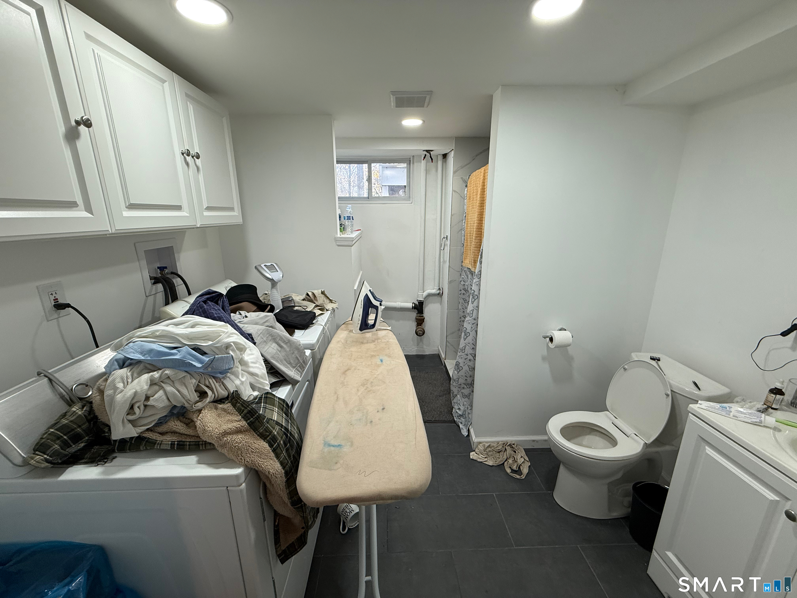 10 Purdy Road Norwalk, CT 06850 - Photo 19 of 21 a bed room with a bed and a toilet