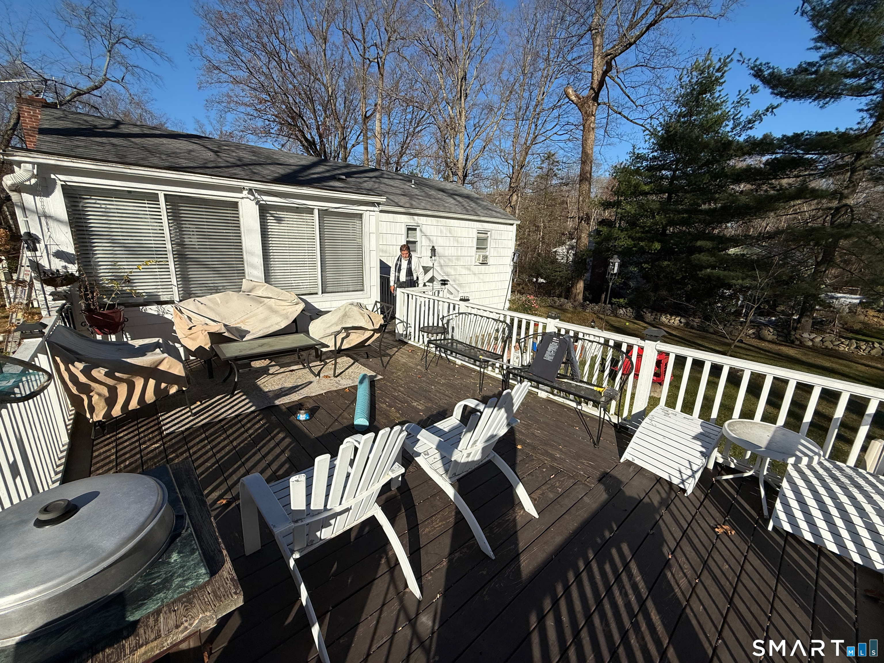 10 Purdy Road Norwalk, CT 06850 - Photo 8 of 21 a view of a patio with table and chairs with barbeque grill and wooden floor