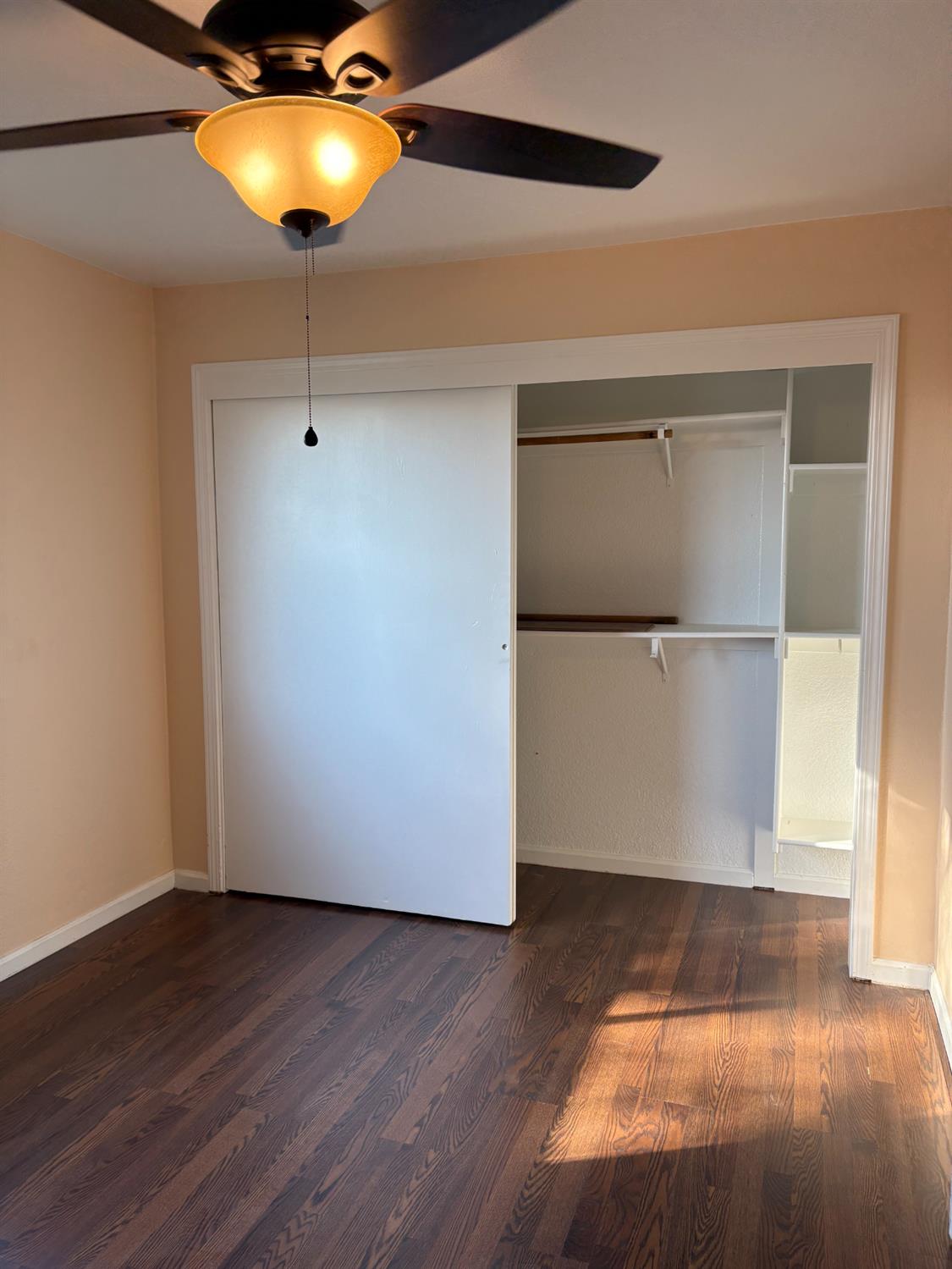 4654 Powerline Road Olivehurst, CA 95961 - Photo 12 of 16 a view of a room with wooden floor