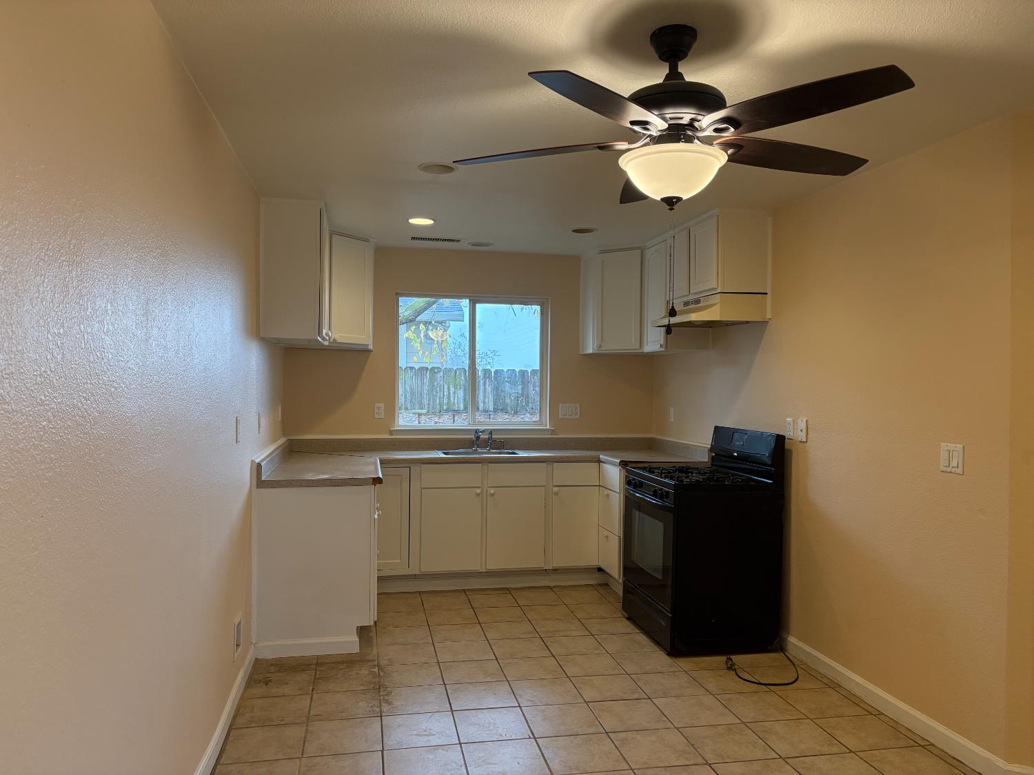 4654 Powerline Road Olivehurst, CA 95961 - Photo 7 of 14 a kitchen with a cabinets and appliances
