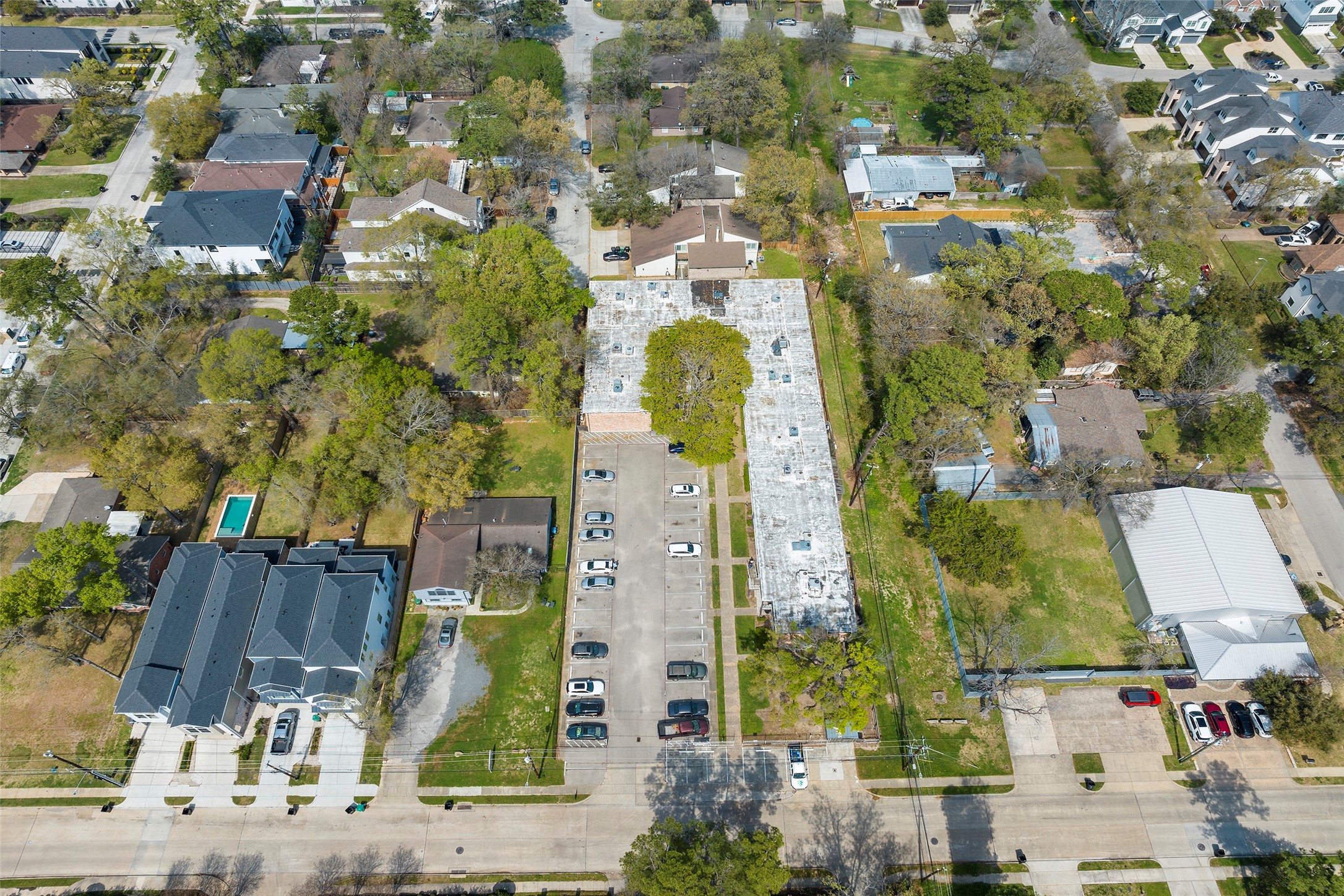 7510 Shadyvilla Lane, Unit 23 Houston, TX 77055 - Photo 22 of 23 an aerial view of residential houses with outdoor space and parking