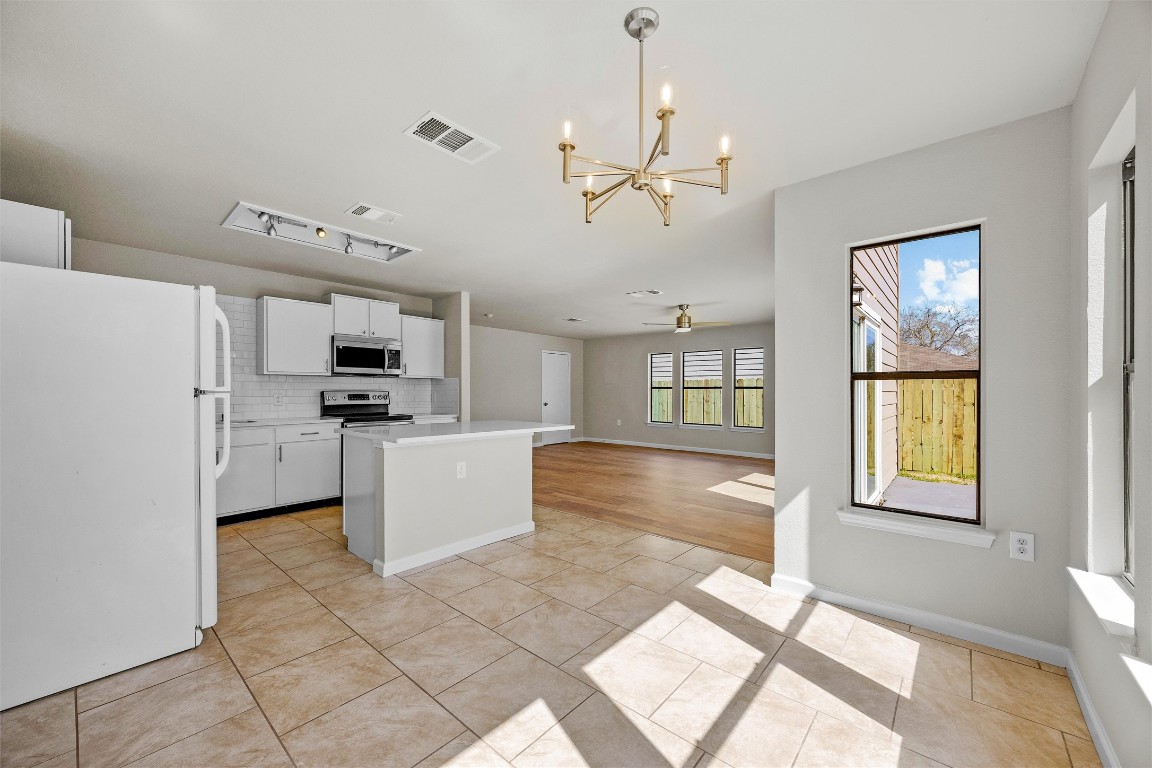 7541 Redrick Drive Austin, TX 78747 - Photo 22 of 40 a view of kitchen with furniture and window