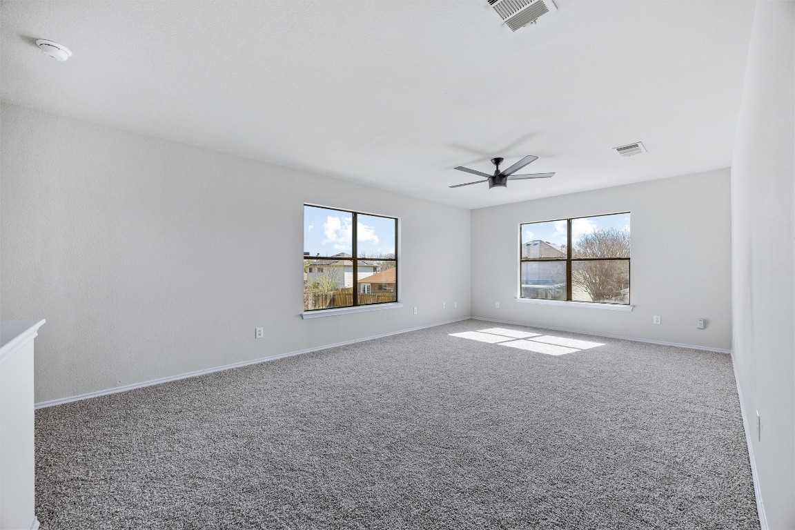 7541 Redrick Drive Austin, TX 78747 - Photo 26 of 40 an empty room with windows and closet