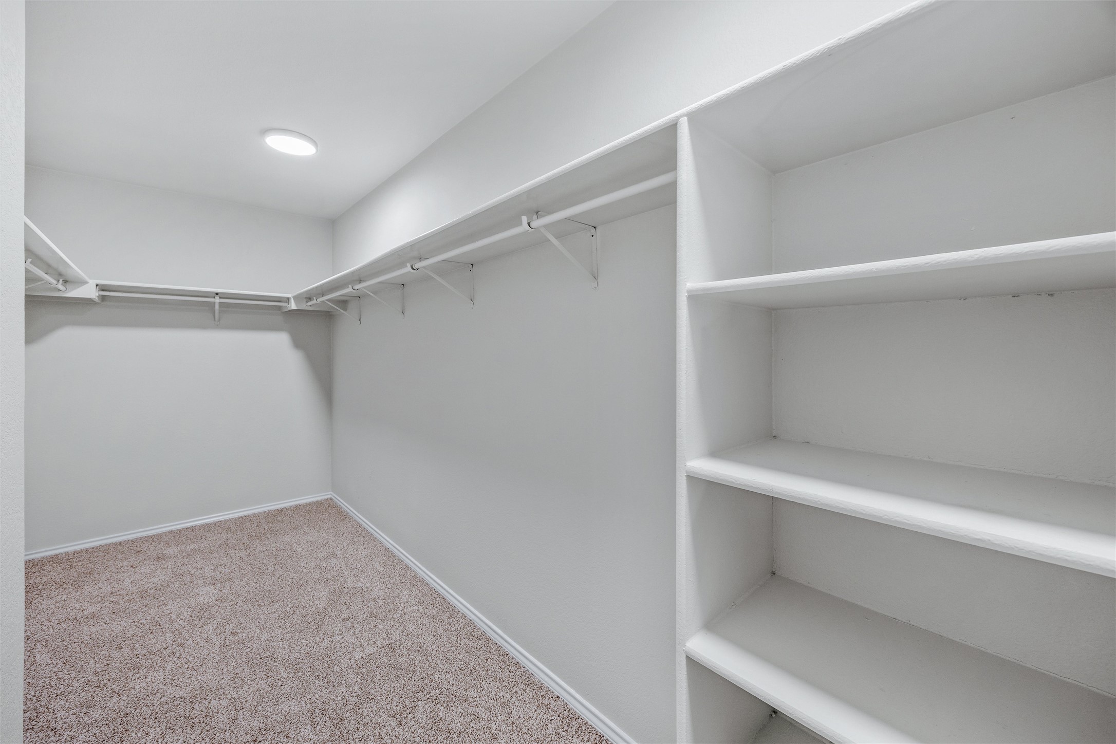 7541 Redrick Drive Austin, TX 78747 - Photo 30 of 40 a view of an empty walk in closet