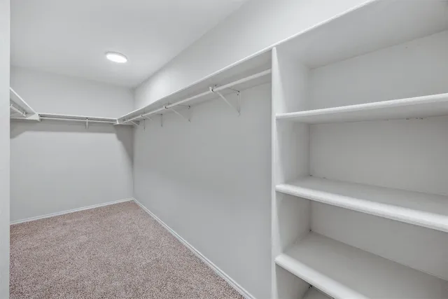 a bathroom with a sink vanity and a mirror