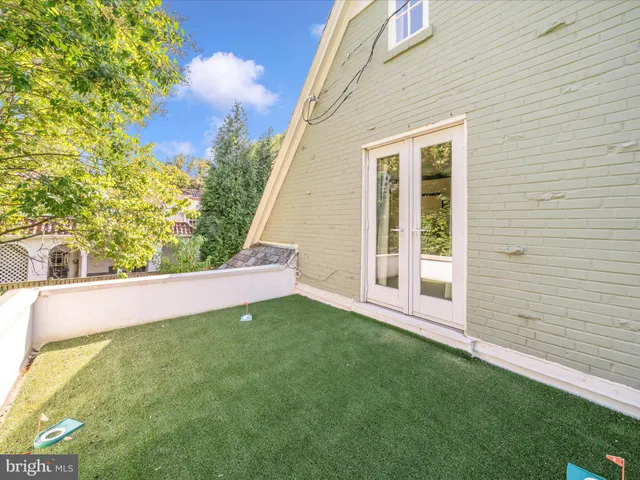 a bathroom with a sink toilet and mirror