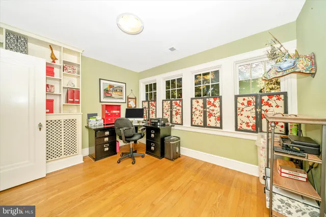 a kitchen with a sink appliances and cabinets