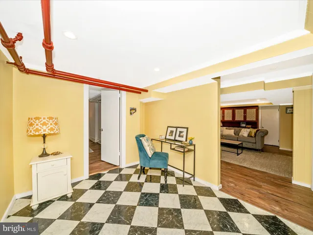 a view of a house with a yard and tree s