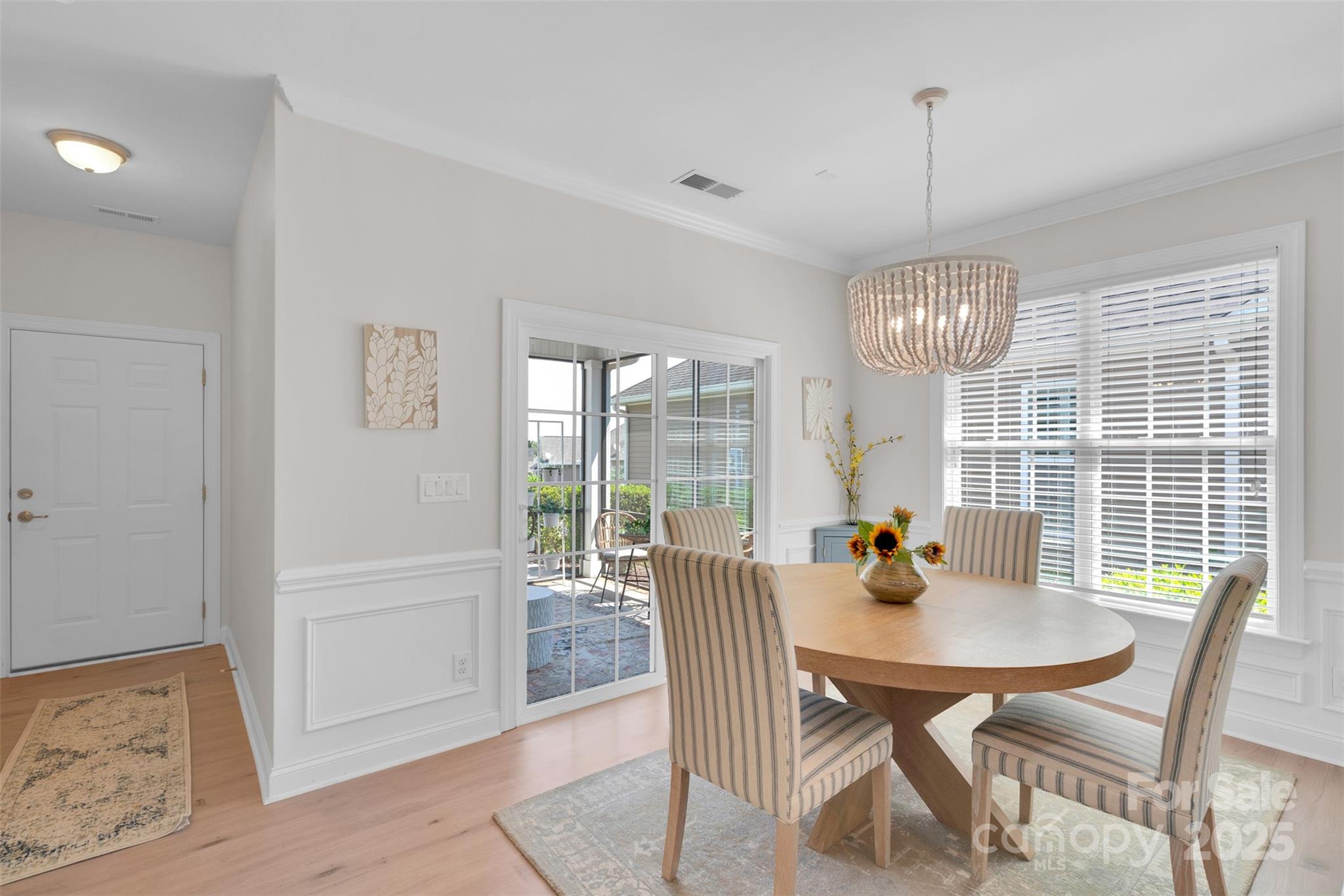 13415 Hazelbrook Lane Cornelius, NC 28031 - Photo 12 of 29 a view of a dining room with furniture wooden floor and chandelier