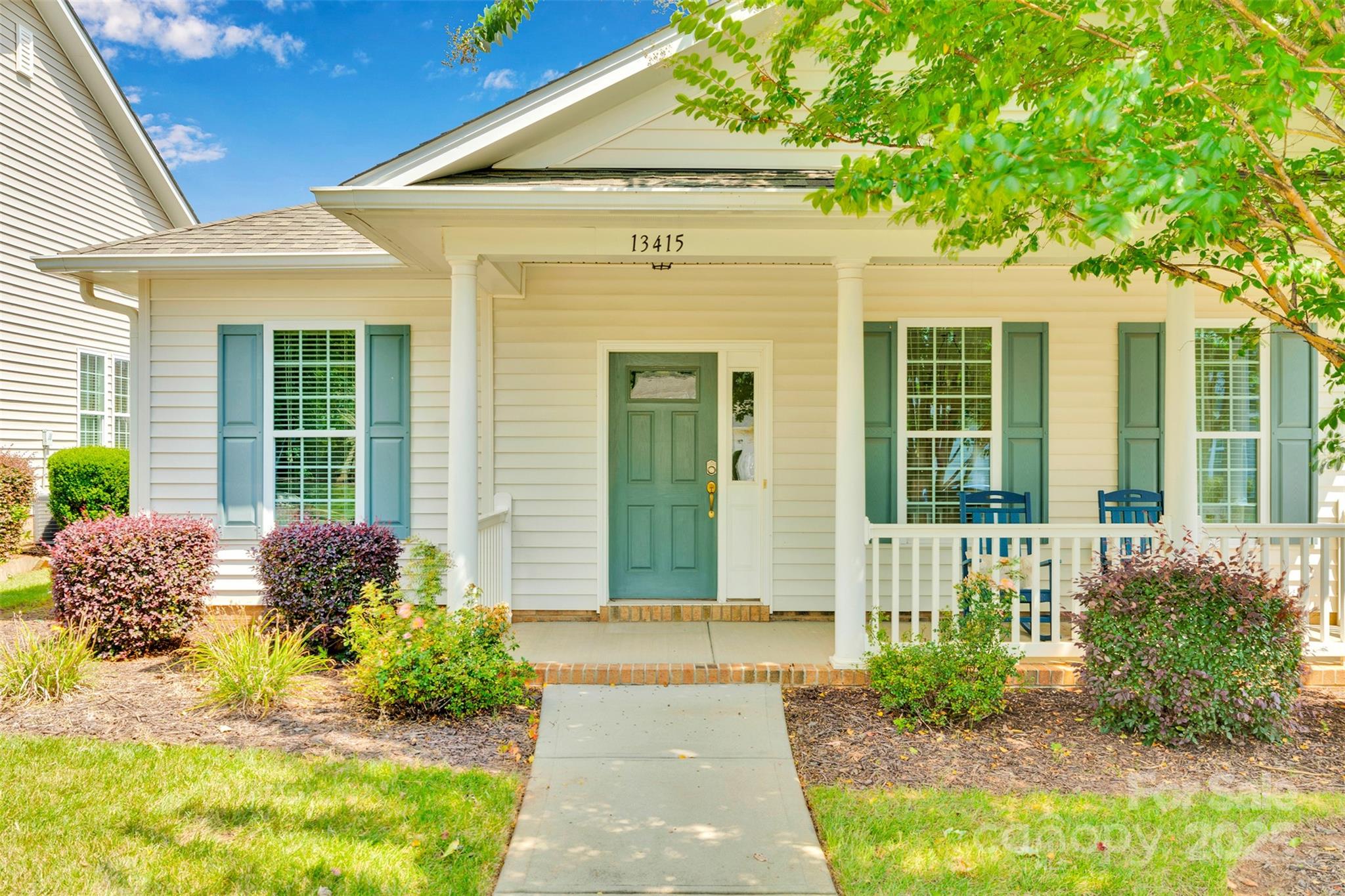 13415 Hazelbrook Lane Cornelius, NC 28031 - Photo 29 of 29 a front view of a house with garden