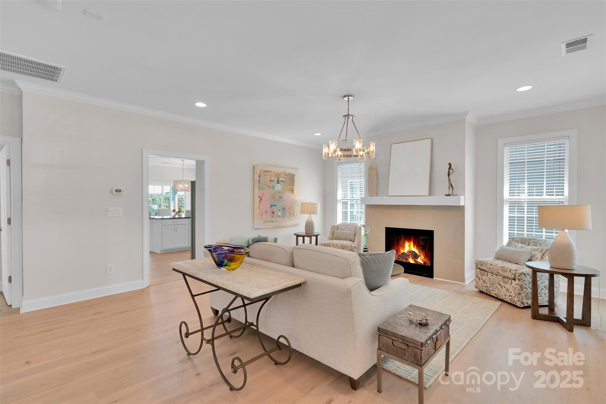 13415 Hazelbrook Lane Cornelius, NC 28031 - Photo 5 of 29 a living room with furniture and a fireplace