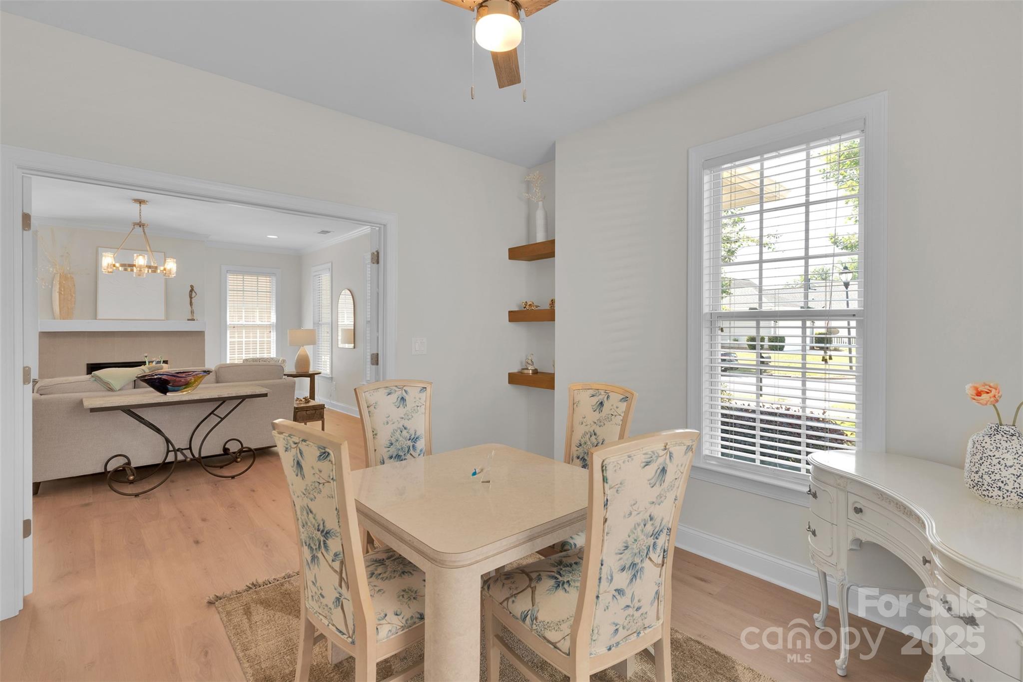 13415 Hazelbrook Lane Cornelius, NC 28031 - Photo 6 of 29 a view of a dining room with furniture and wooden floor
