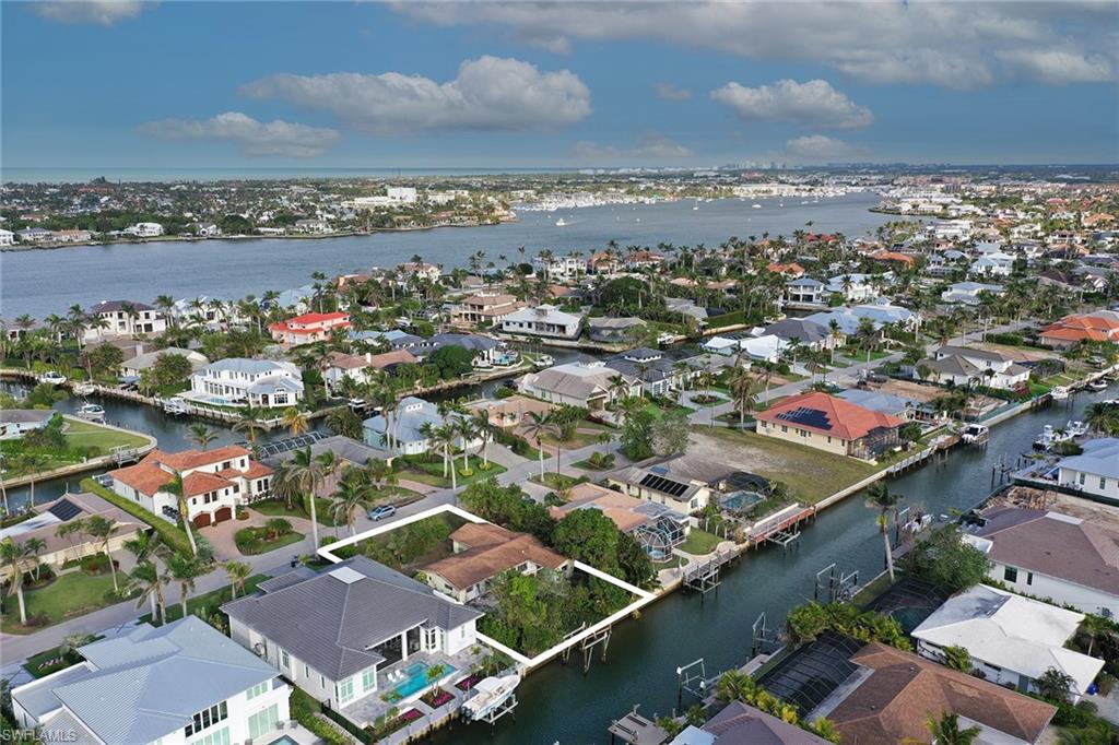 2165 Tarpon Road Naples, FL 34102 - Photo 2 of 4 an aerial view of a city