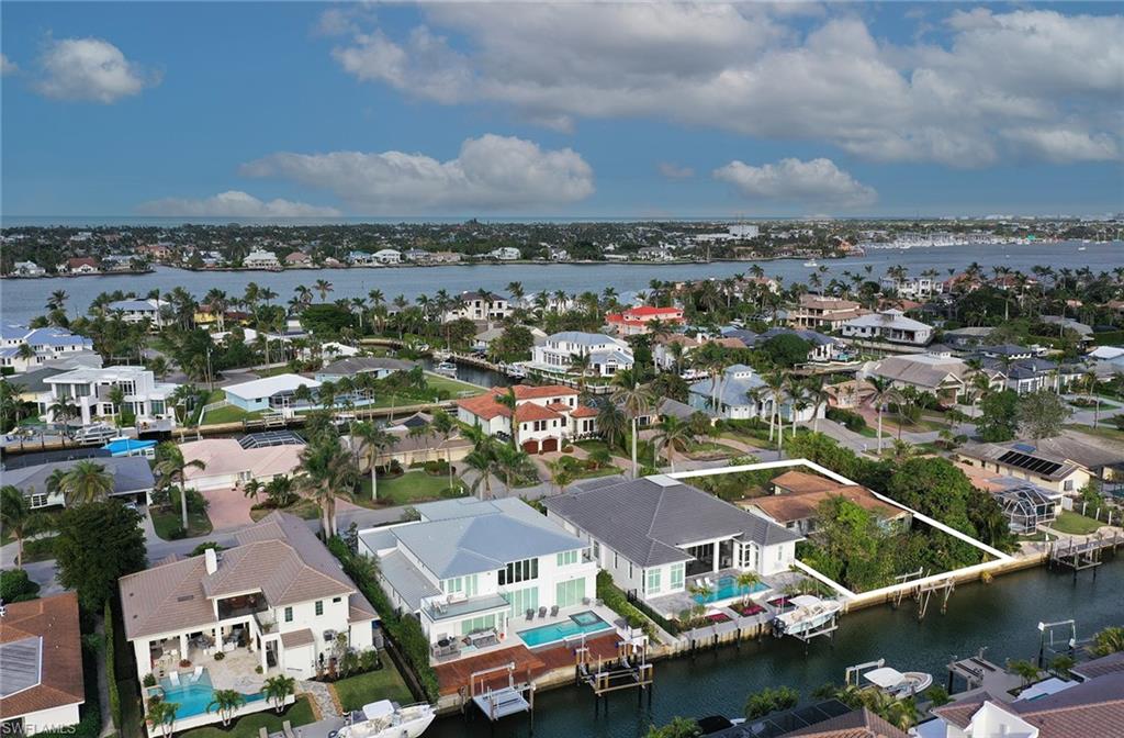 2165 Tarpon Road Naples, FL 34102 - Photo 3 of 4 an aerial view of residential houses with outdoor space