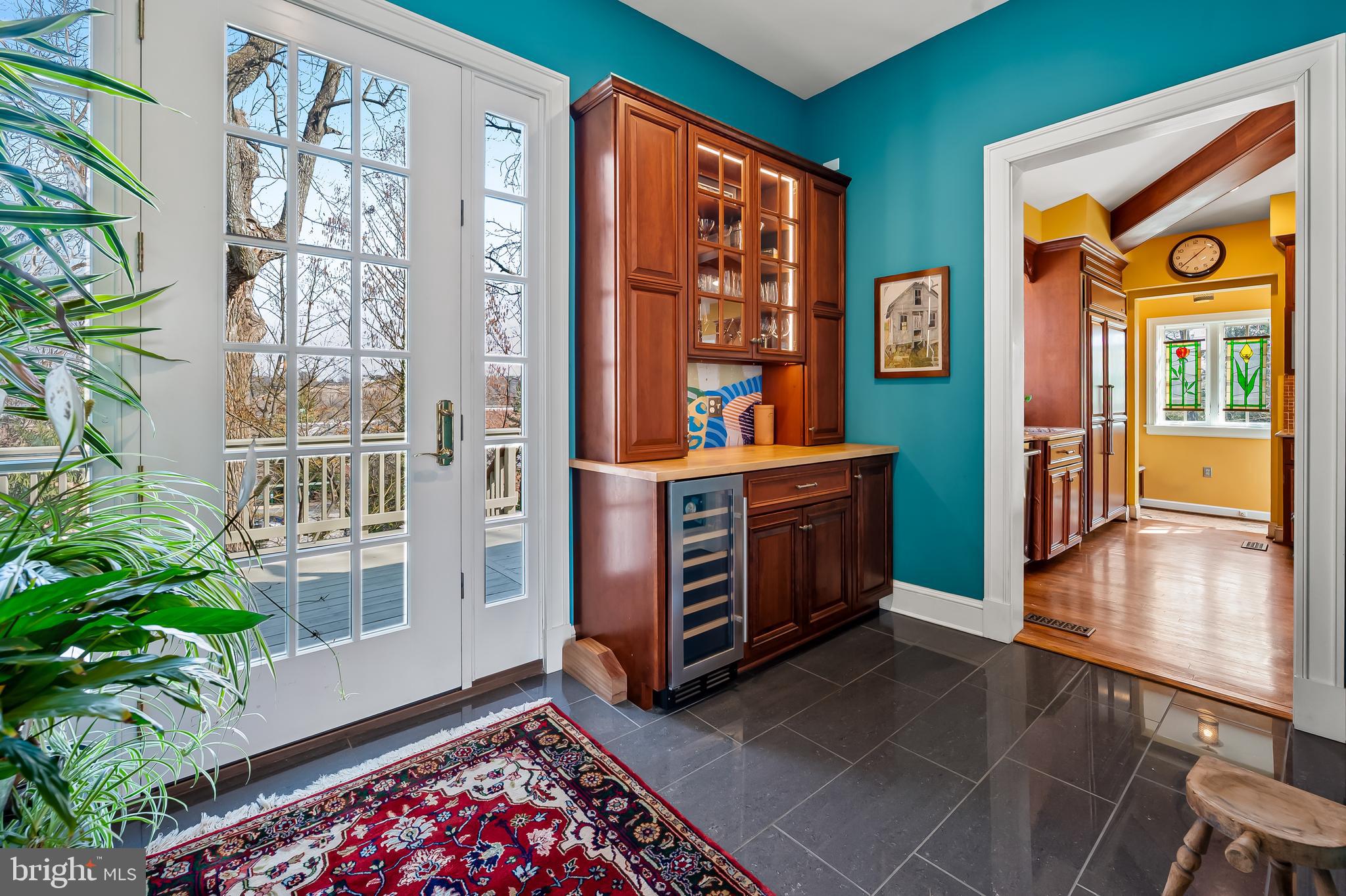 1605 Terrace Road Baltimore, MD 21209 - Photo 23 of 45 a view of a hallway with furniture and a potted plant