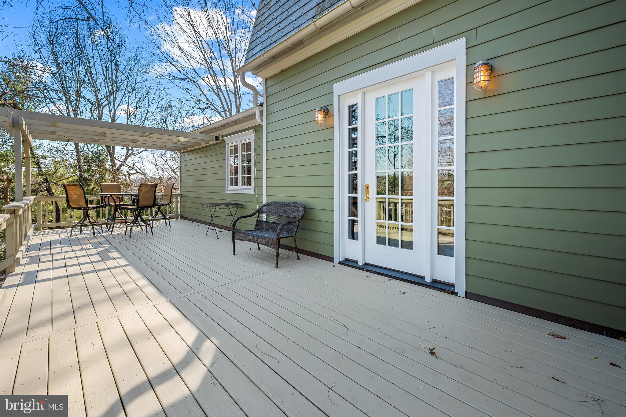 1605 Terrace Road Baltimore, MD 21209 - Photo 41 of 45 a view of backyard with a table and chairs and wooden floor