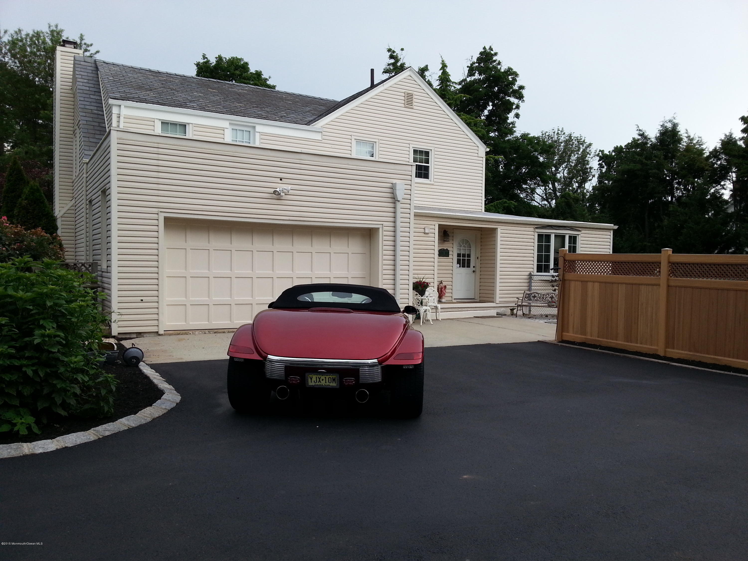 8 Sherwood Road Colonia, NJ 07067 - Photo 3 of 15 a front view of a house with parking space
