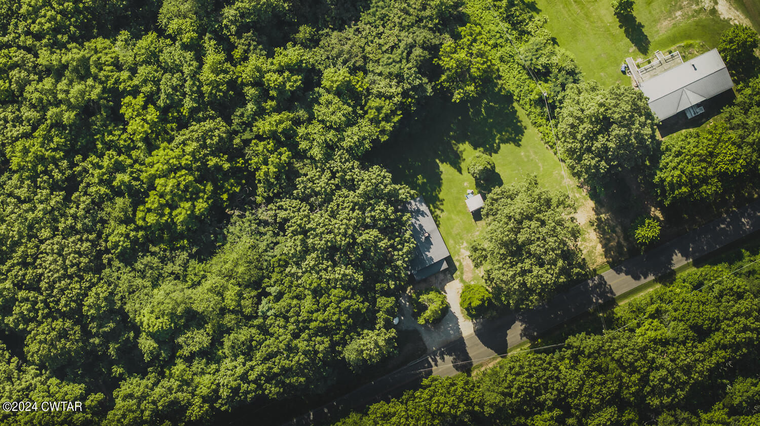 0 Parks Road Gleason, TN 38229 - Photo 1 of 9 an aerial view of a house with a yard