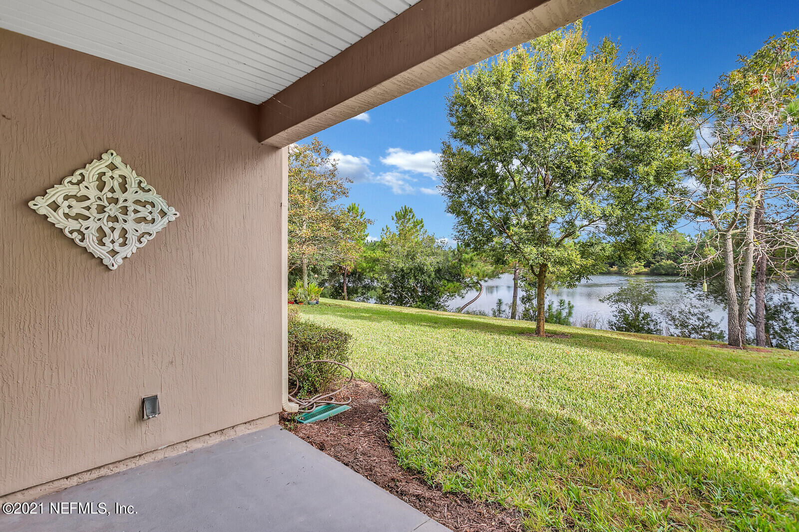 3170 Chestnut Ridge Way Orange Park, FL 32065 - Photo 20 of 32 back covered porch