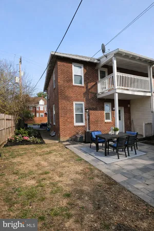 a front view of a house with a porch