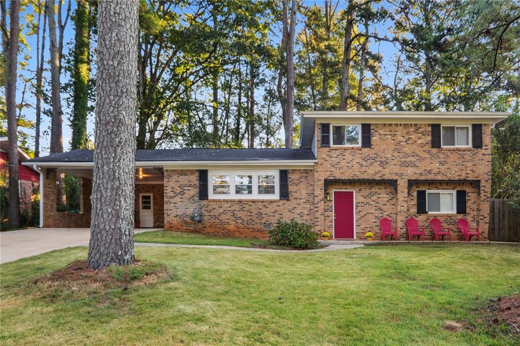 1310 Cornwall Road Decatur, GA 30032 - Photo 1 of 1 a front view of house with yard