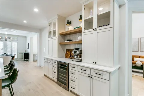 workspace with white cabinets and window