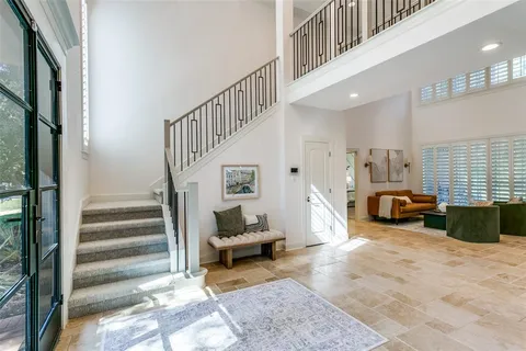 a view of entryway livingroom and hall