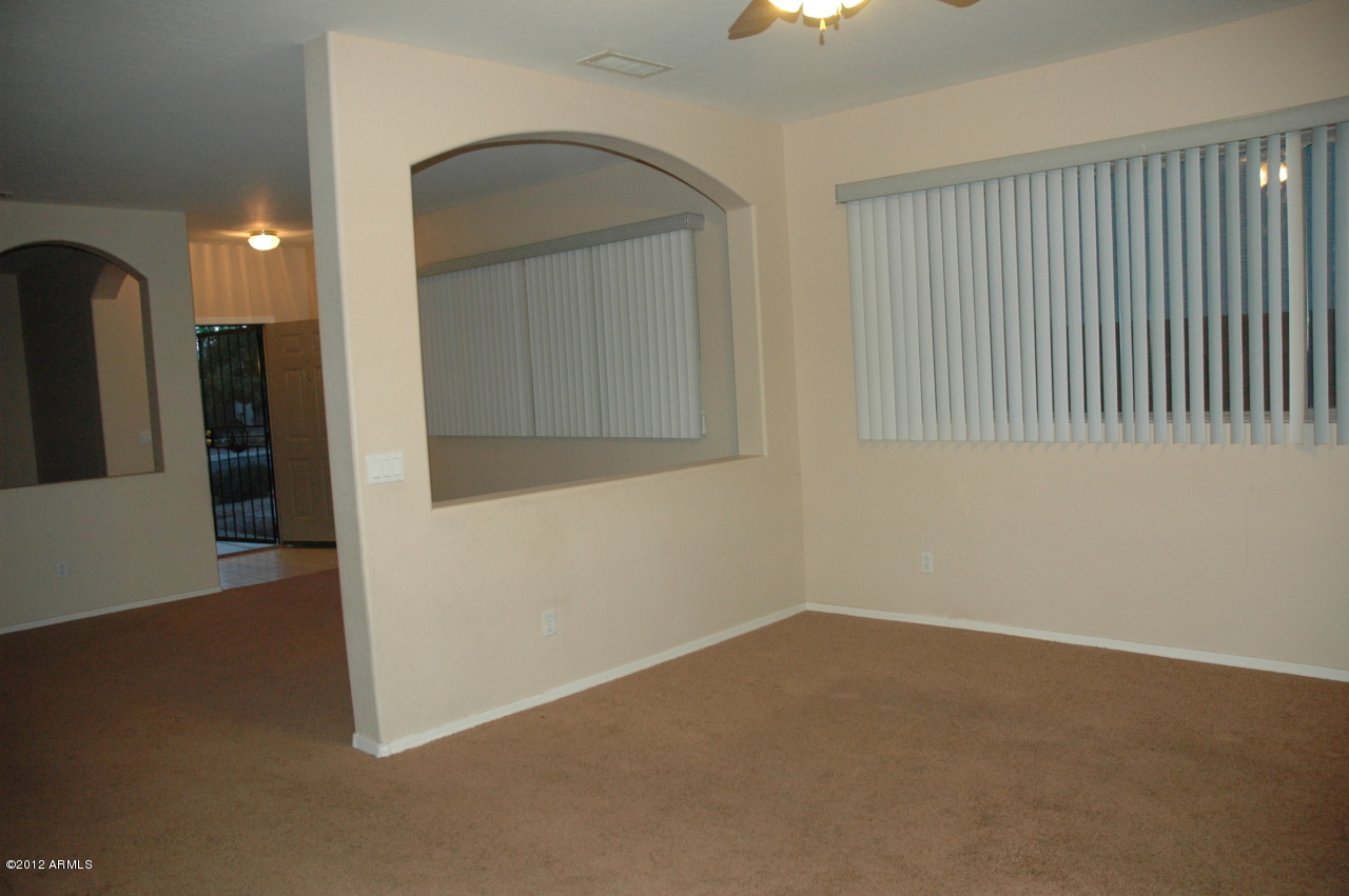 11186 West Berkeley Road Avondale, AZ 85392 - Photo 4 of 15 a view of hallway with livingroom