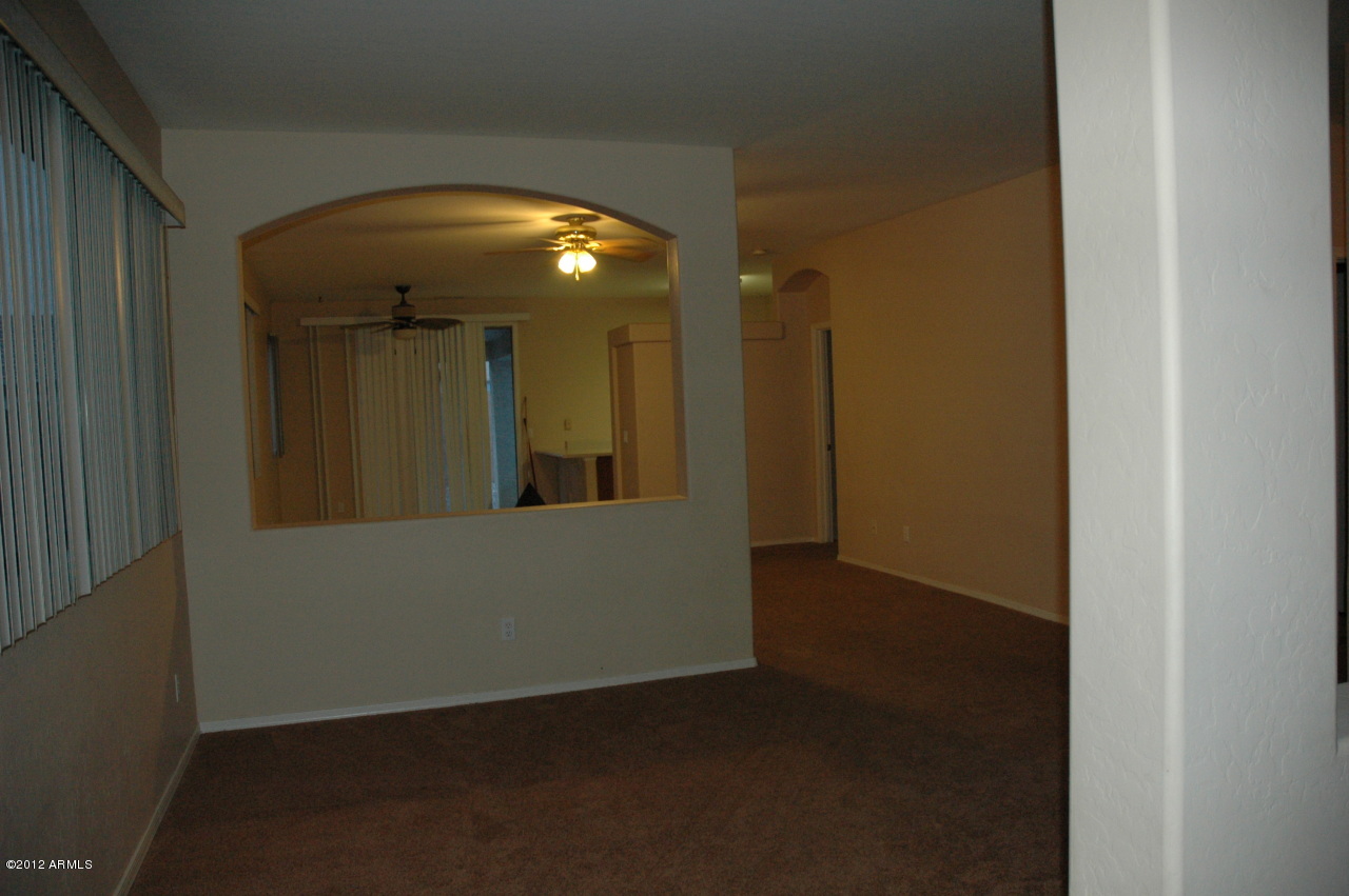 11186 West Berkeley Road Avondale, AZ 85392 - Photo 7 of 15 a view of livingroom with hallway