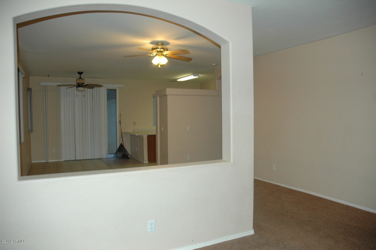 11186 West Berkeley Road Avondale, AZ 85392 - Photo 9 of 15 a view of a livingroom with a chandelier