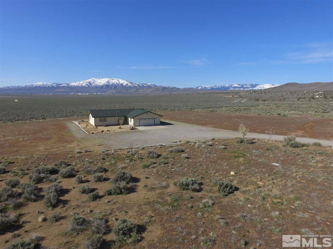 1205 Antelope Valley Road Reno, NV 89508 - Photo 1 of 1 a view of a lake with mountain in the background
