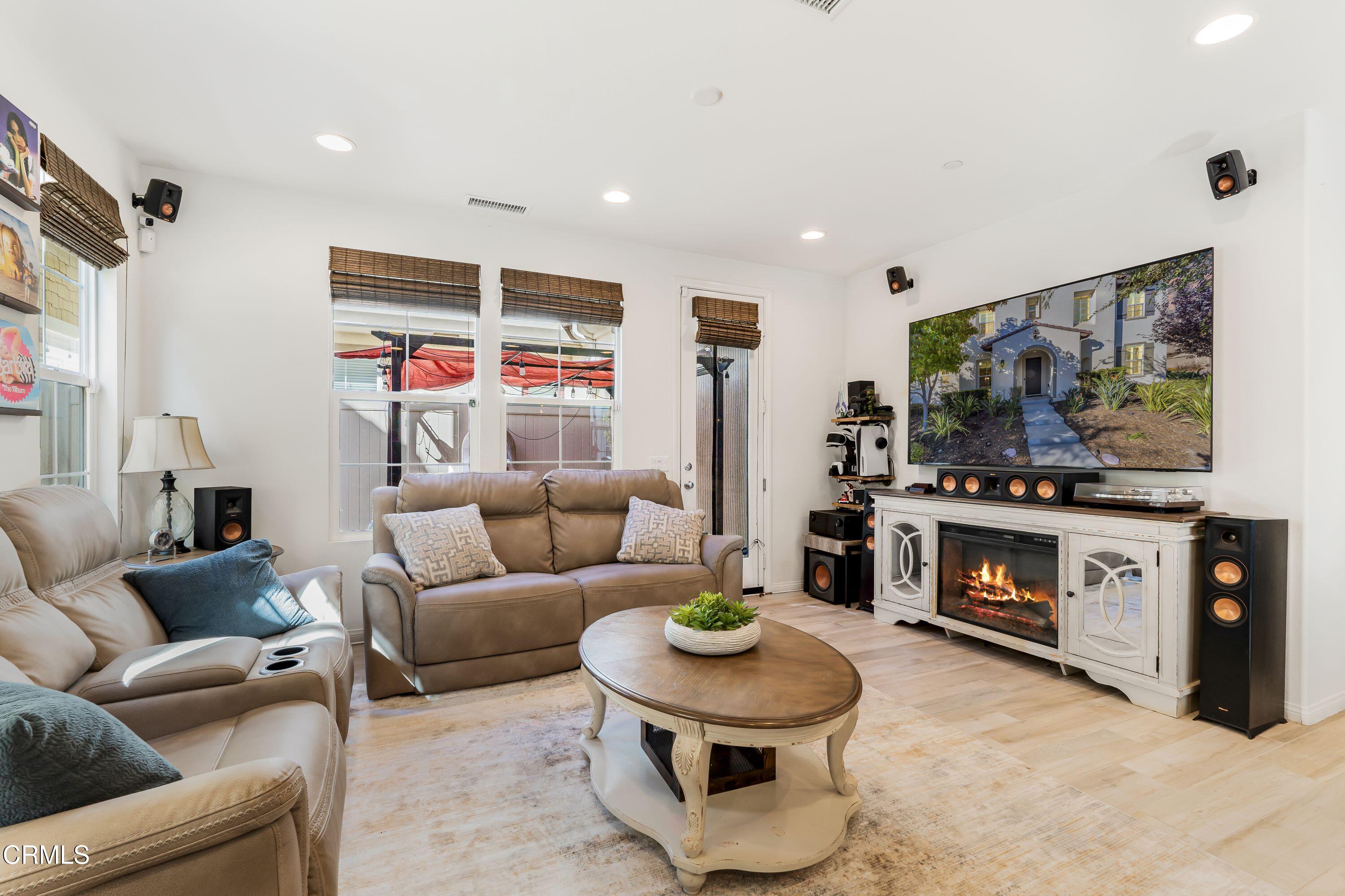 241 Stonegate Road Camarillo, CA 93010 - Photo 11 of 33 a living room with furniture and a flat screen tv