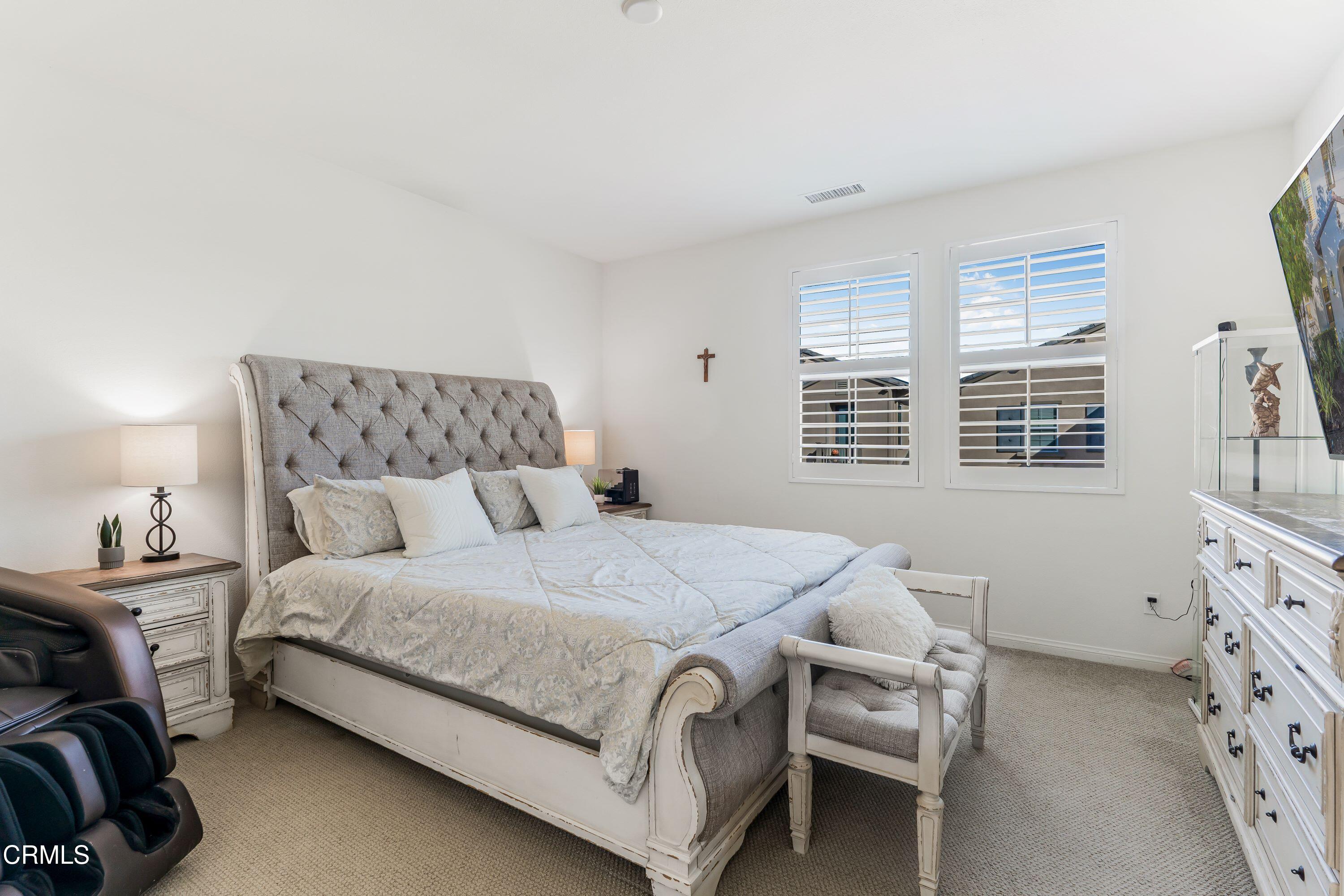 241 Stonegate Road Camarillo, CA 93010 - Photo 14 of 33 a bedroom with a bed and a window