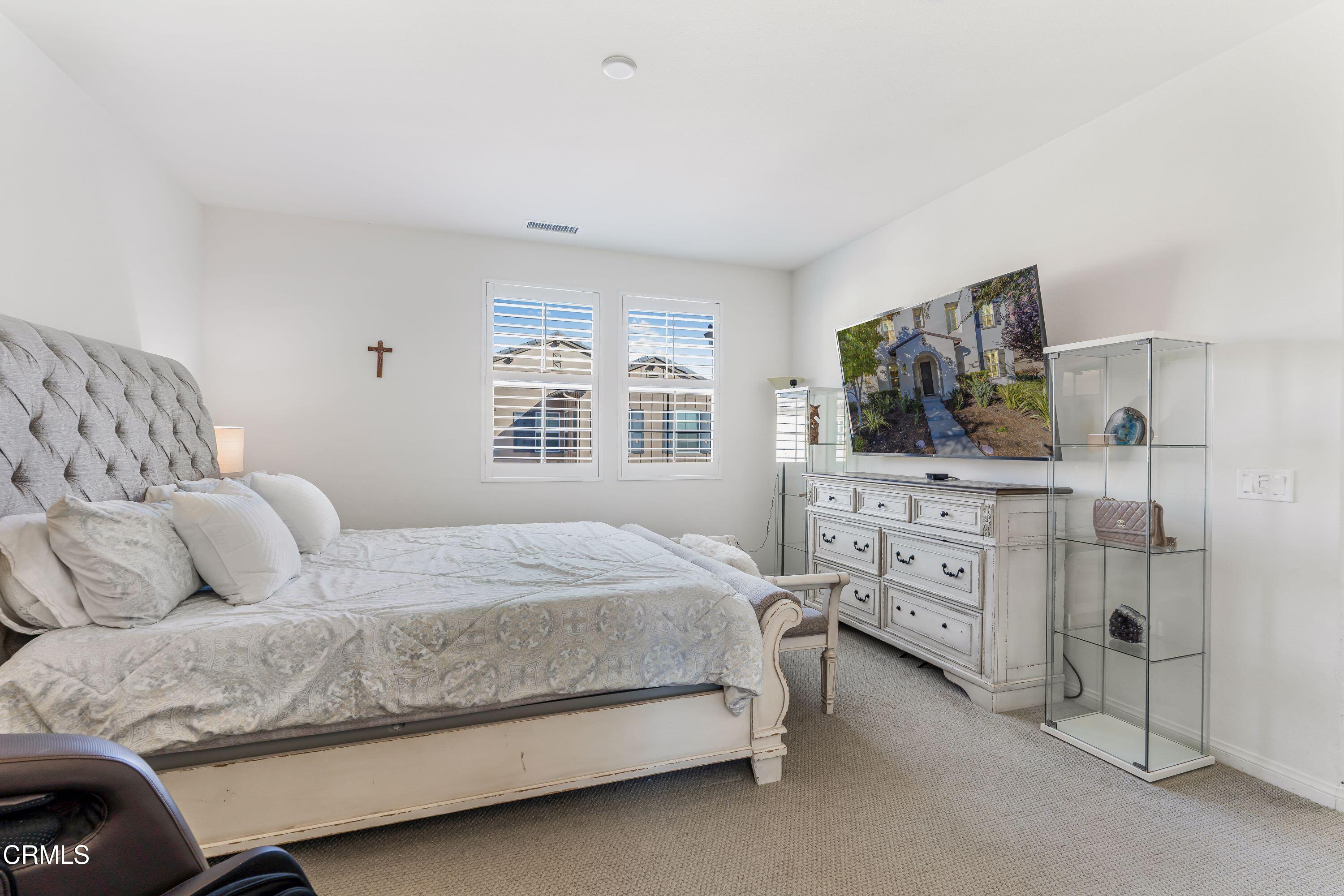 241 Stonegate Road Camarillo, CA 93010 - Photo 15 of 33 a bedroom with a bed and a dresser