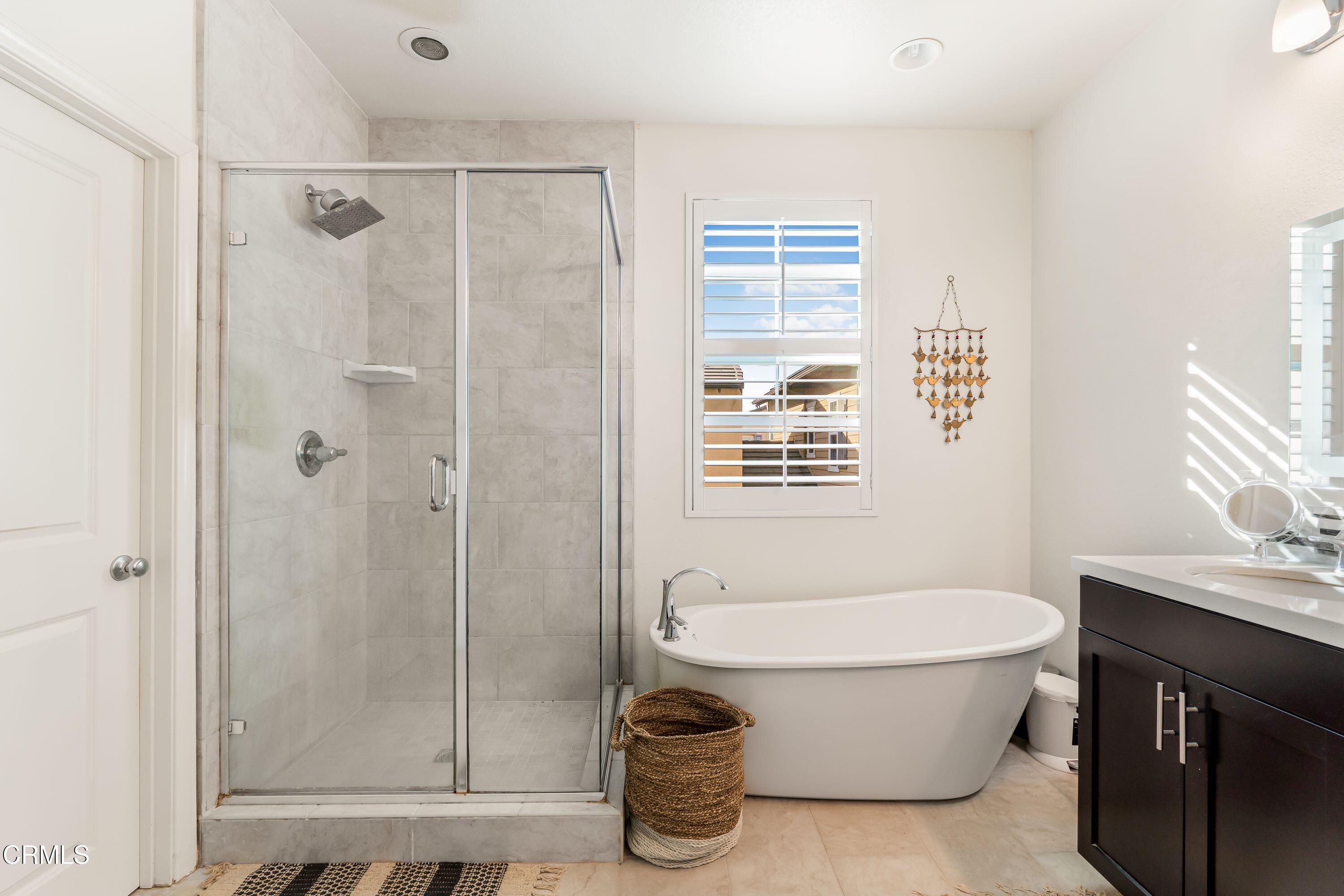 241 Stonegate Road Camarillo, CA 93010 - Photo 17 of 33 a bathroom with a sink a toilet and shower