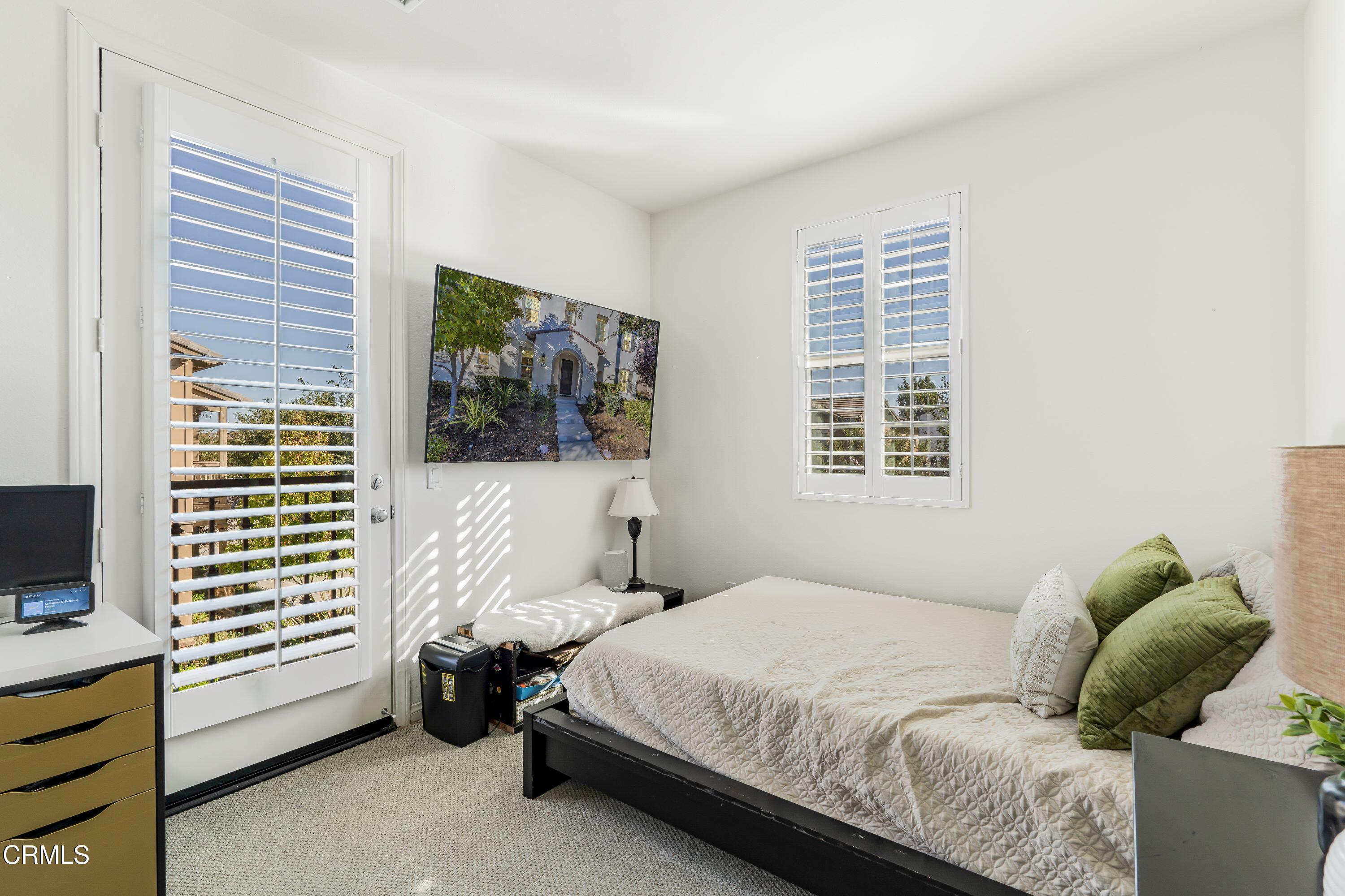 241 Stonegate Road Camarillo, CA 93010 - Photo 18 of 33 a bedroom with a bed and a window