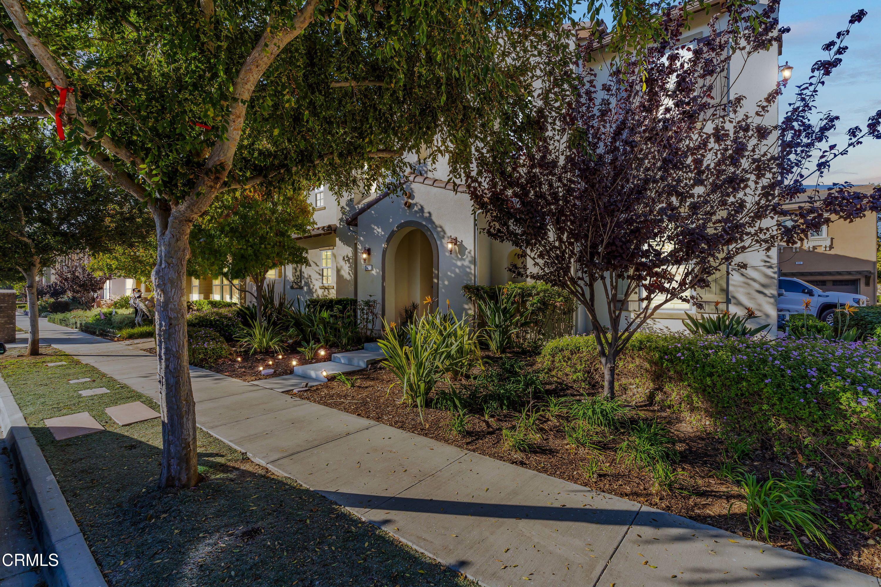 241 Stonegate Road Camarillo, CA 93010 - Photo 2 of 33 a front view of a house with garden