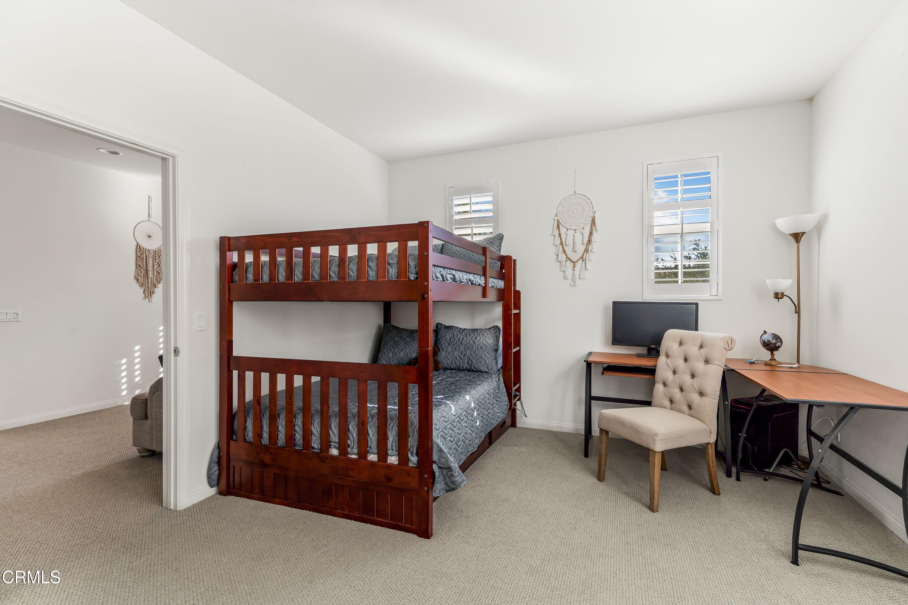 241 Stonegate Road Camarillo, CA 93010 - Photo 21 of 33 a bedroom with furniture a window and a wooden floor