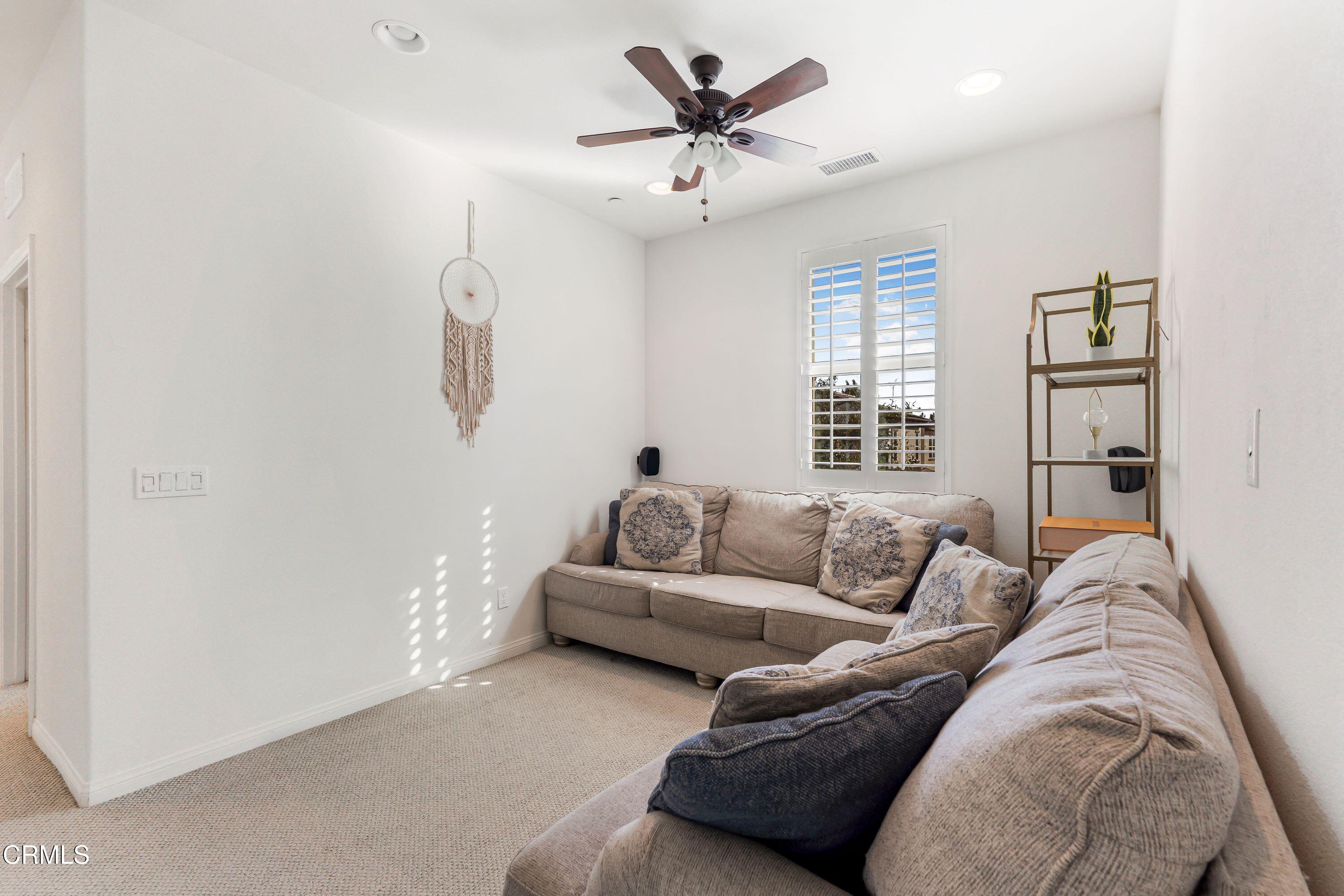 241 Stonegate Road Camarillo, CA 93010 - Photo 24 of 33 a living room with furniture and a window